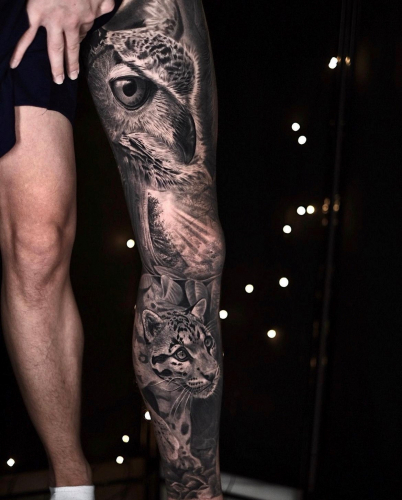 realistic-tattoo-eule-jaguar-auf-bein